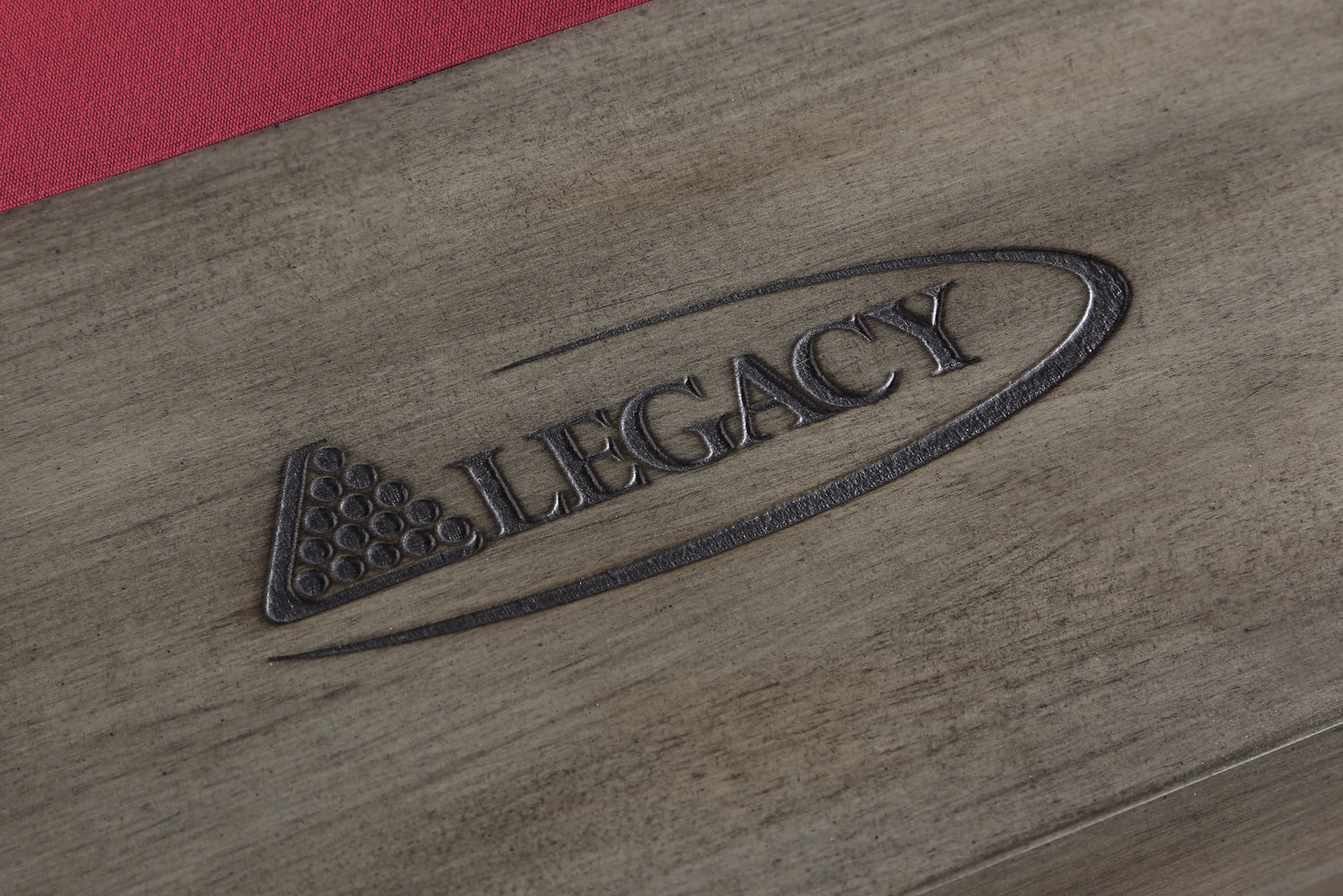 Legacy Billiards Colt II Pool Table in Overcast Finish with Legacy Red Cloth Modern Room Scene - Logo Rail Closeup