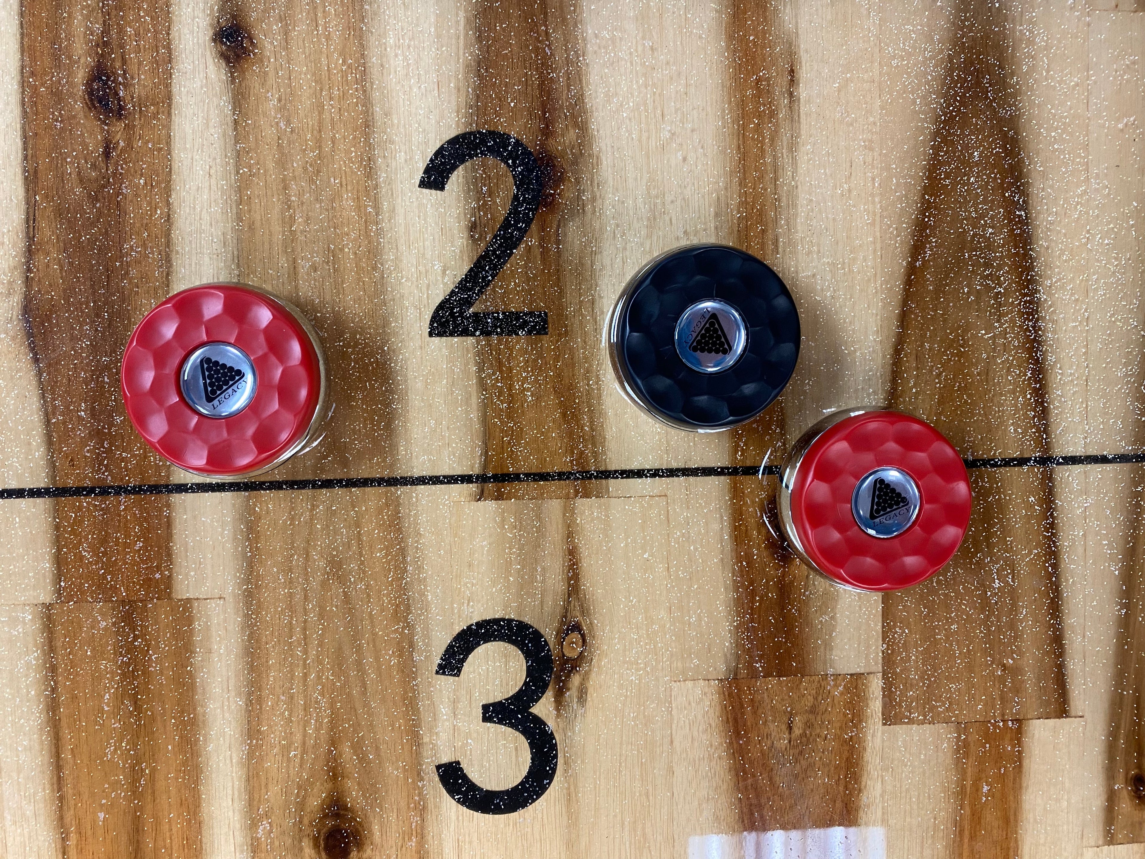 Legacy Billiards Shuffleboard Puck Set on Playfield
