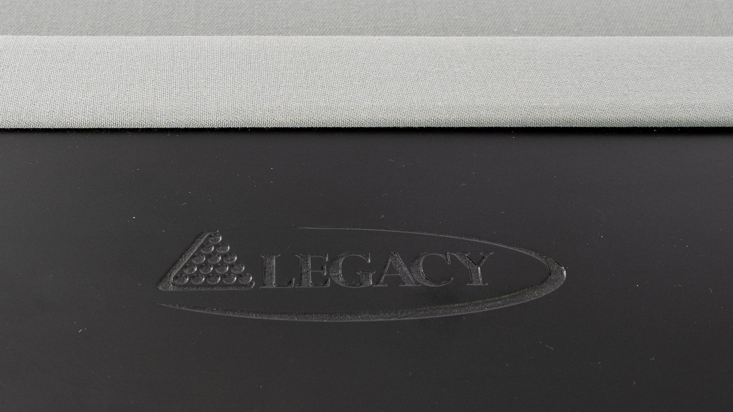 Legacy Billiards Baylor Pool Table in Raven Finish with Grey Cloth - Logo Rail Closeup