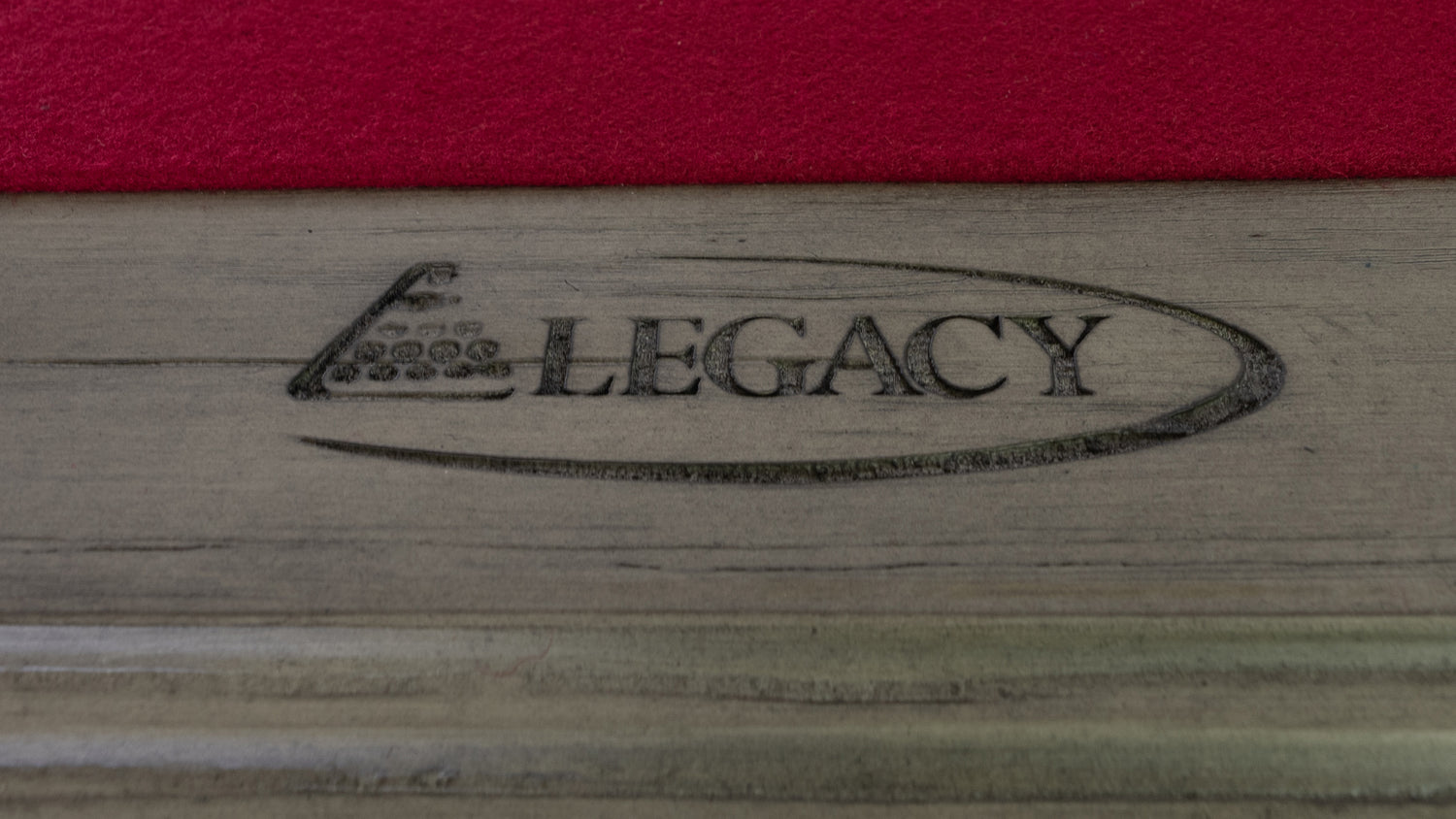 Legacy Billiards Mesa Pool Table in Ash Grey Indoor Finish with Legacy Red Cloth - Rail with Logo Closeup
