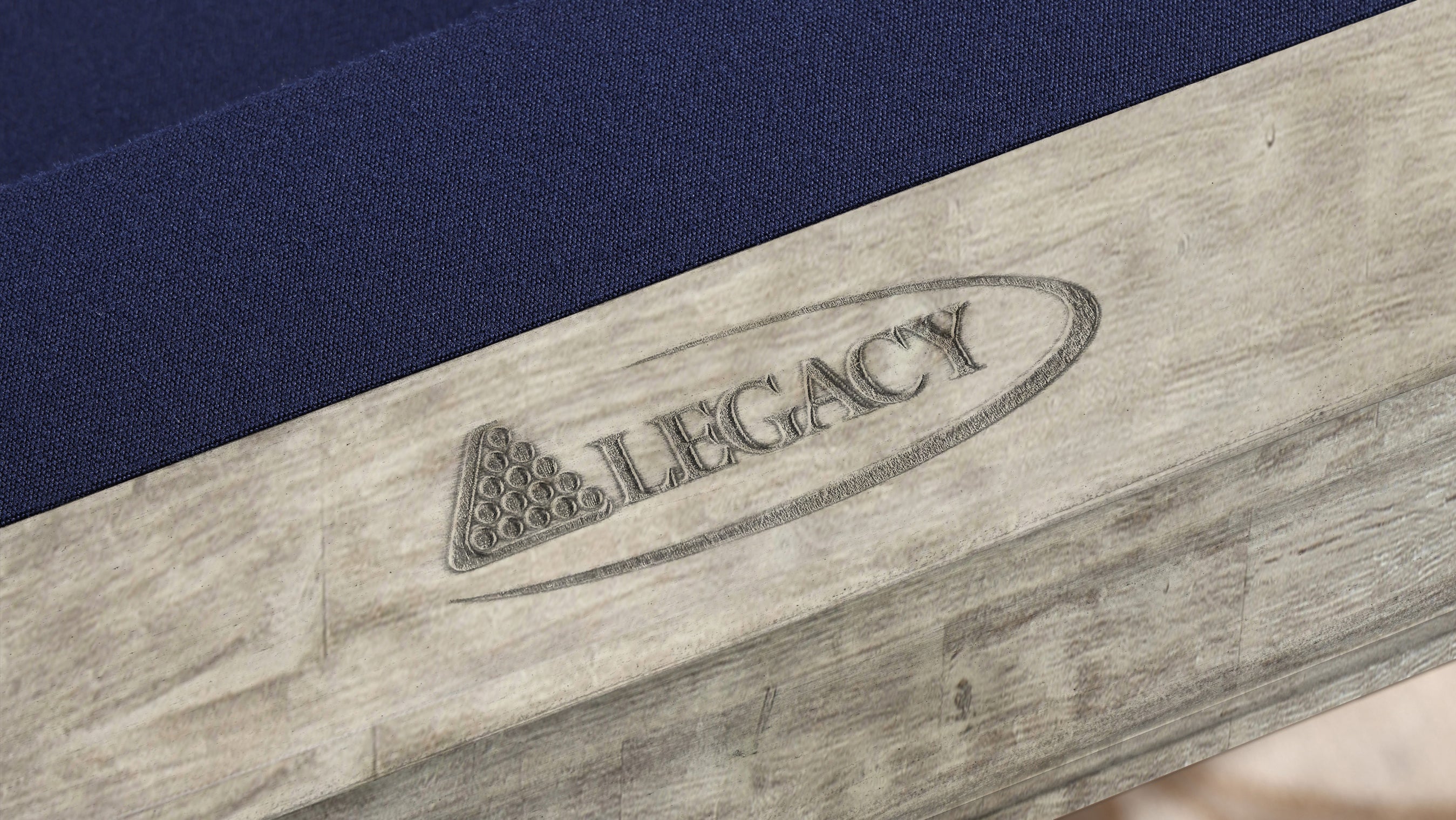 Legacy Billiards 7 Ft Mesa Pool Table in Ash Grey Indoor Finish with Blue Cloth - Room Scene Rail with Logo Closeup