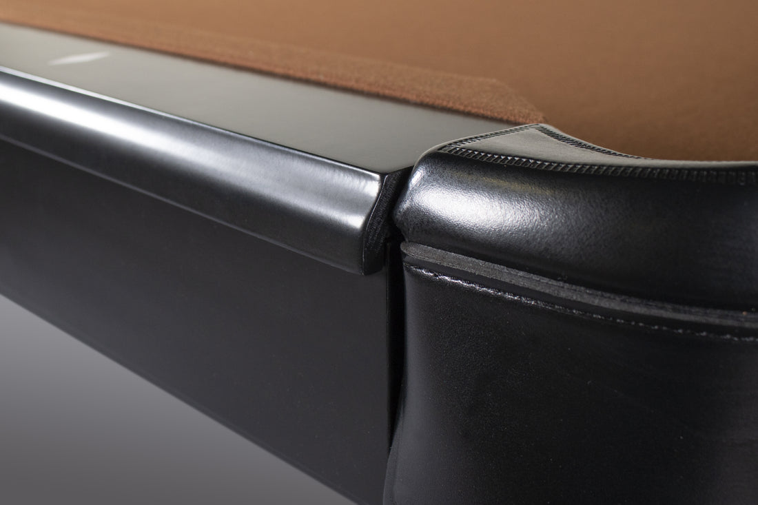 Closeup of Legacy Billiards Colt pool table rail and pocket in Raven finish